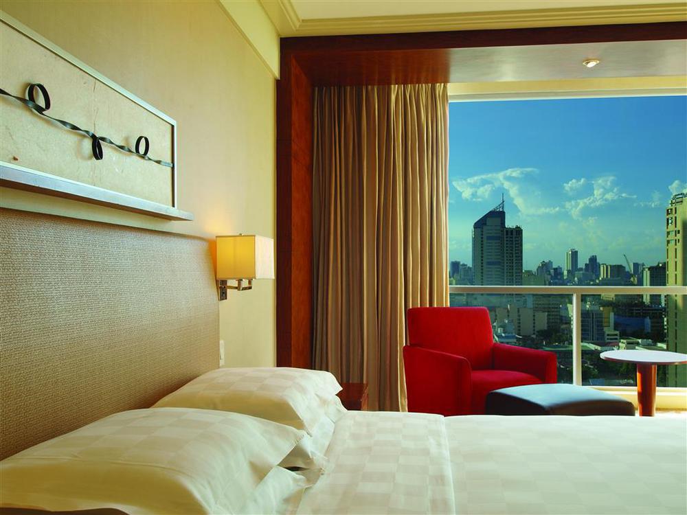 New Coast Hotel Manila Quarto foto A room at the hotel
